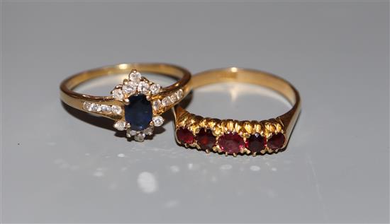 A modern 18ct gold, sapphire and diamond cluster ring and an 18ct and five stone ring, sizes Q/R & R/S, gross 6.8 grams.